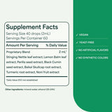 NutraMedix Nutra-Hist servido en un vaso para mezcla y toma cómoda