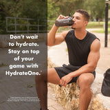 NutraOne HydrateOne en gimnasio junto a botellas resaltando recuperación rápida