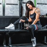 Nutrex Research batido de chocolate whey en vaso para recuperación postentreno rápida