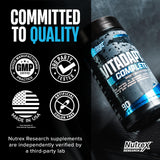 Nutrex Research Vitadapt en ambiente de gimnasio con pesas, evoca enfoque deportivo y uso regular