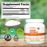 NutriBiotic comparación de tamaño junto a una taza para escala visual