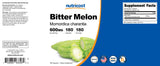 Frasco Nutricost Bitter Melon en cocina moderna sugiriendo integración en la rutina diaria