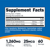 Primer plano de tabletas Nutricost Calcium Citrate para ver textura y tamaño