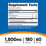 Nutricost cápsulas en mano para comparar tamaño y dosis práctica
