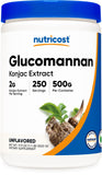 Nutricost frasco frontal mostrando 500 g y cuchara dosificadora para suministro claro