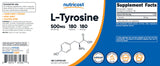 Escena lifestyle con Nutricost L-Tyrosine en mesa junto a objetos diarios