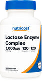 Nutricost bote frontal mostrando etiqueta y beneficio de dosificación clara
