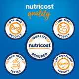 Nutricost cápsula junto a moneda para comparar el tamaño y conveniencia