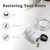 Nutritional Roots botella abierta con cápsulas dispersas que sugiere suministro mensual