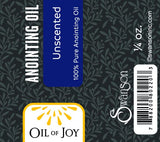 Oil Of Joy comparación de tamaño junto a mano para escala portatil