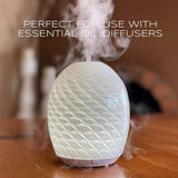 Ola Prima difusor encendido ambientando habitación con aroma cálido