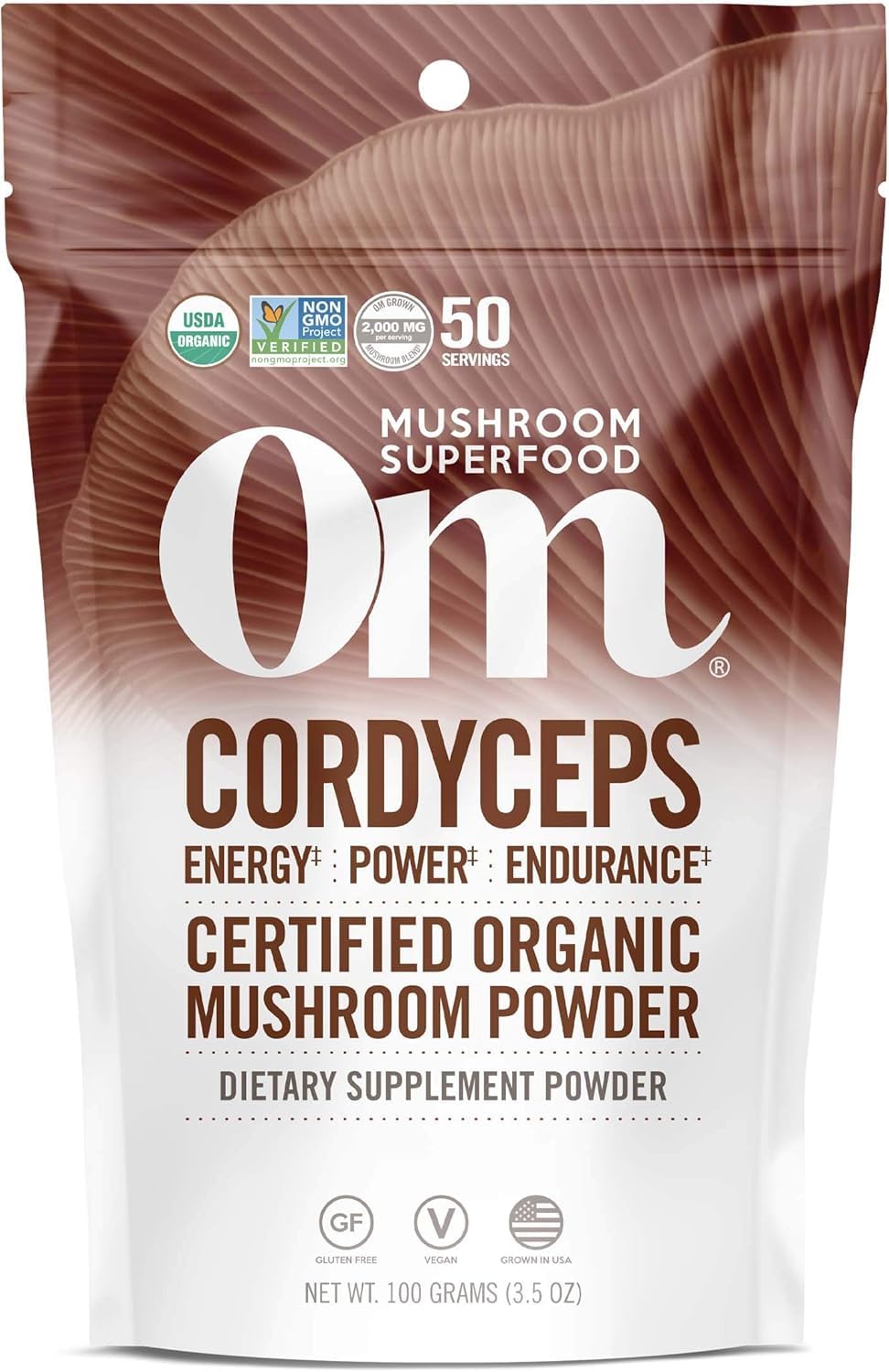 OM MUSHROOM SUPERFOOD frontal del empaque mostrando certificaciones y beneficio energético