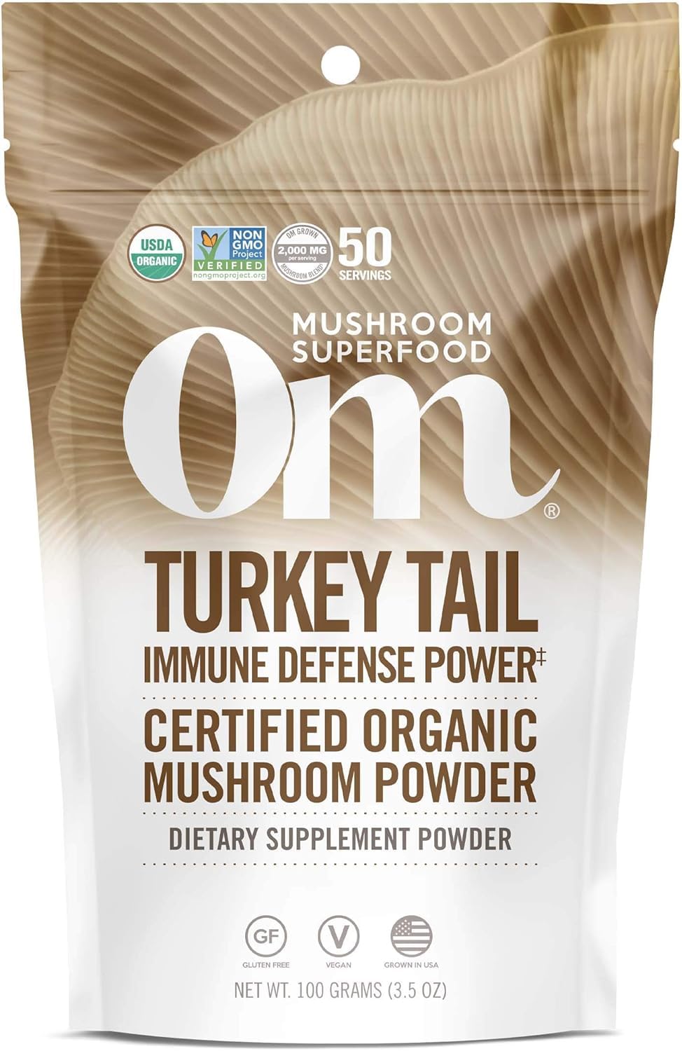 OM MUSHROOM SUPERFOOD envase frontal mostrando 50 porciones y beneficio de conveniencia