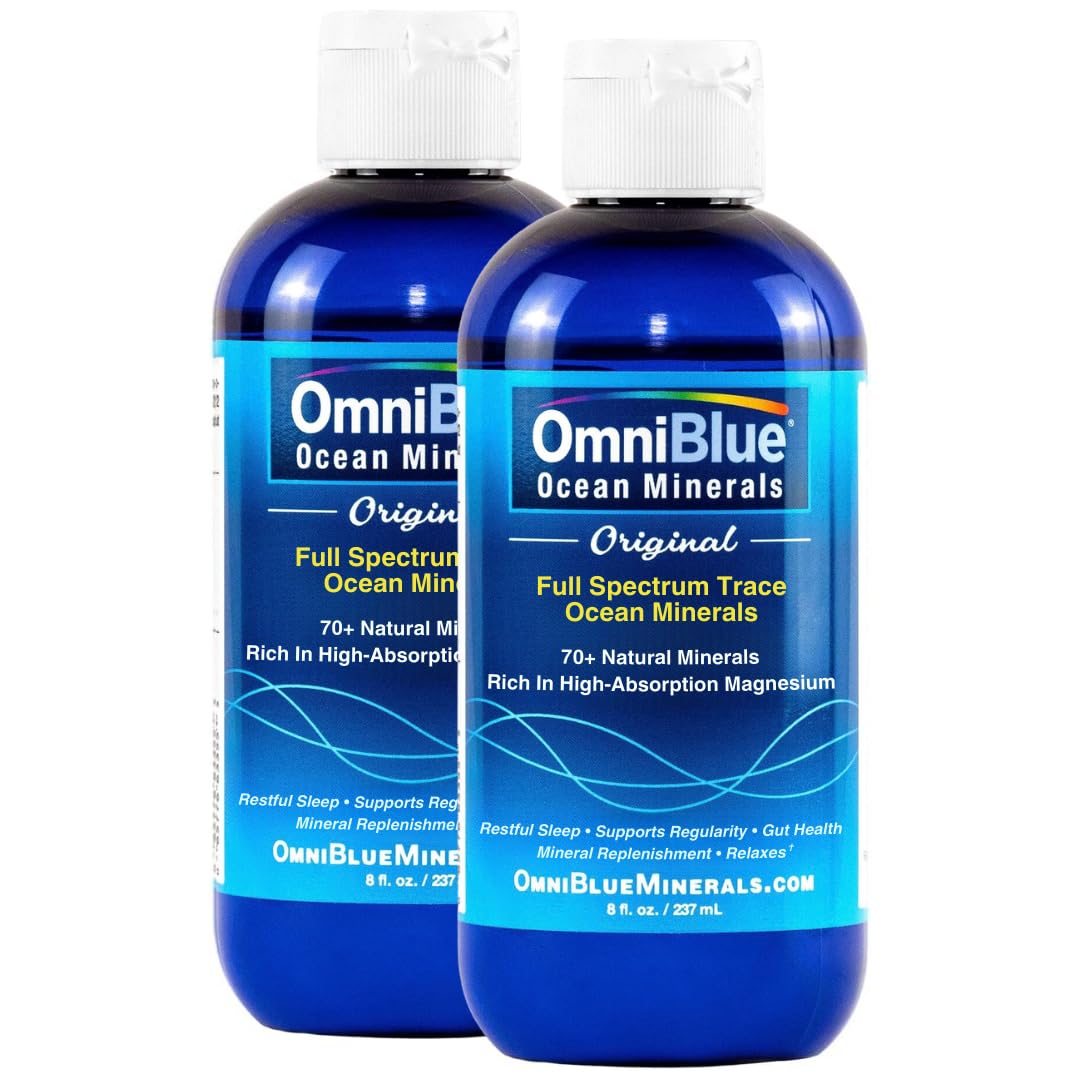 OmniBlue botella frontal con etiqueta clara mostrando minerales y beneficio de reponer oligoelementos