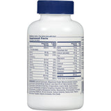 One A Day etiqueta nutricional detallada mostrando dosis y advertencias