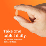 One A Day tabletas al lado de un desayuno para mostrar uso diario con comida