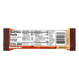 ONE Reese's barra sobre mesa de desayuno mostrando conveniencia y disfrute