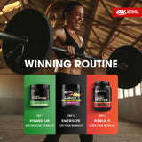 Cucharilla medidora con polvo Optimum Nutrition Amped preparada para servir