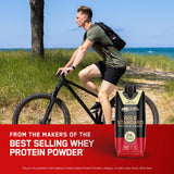Optimum Nutrition batido junto a fruta y equipo, apoyo a rutinas activas