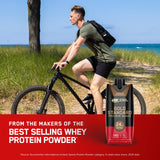 Optimum Nutrition botella junto a equipo de gimnasio, apoyo postentreno