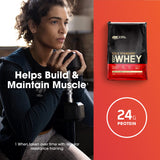 Optimum Nutrition envase junto a una pesa para comparar tamaño y servicios