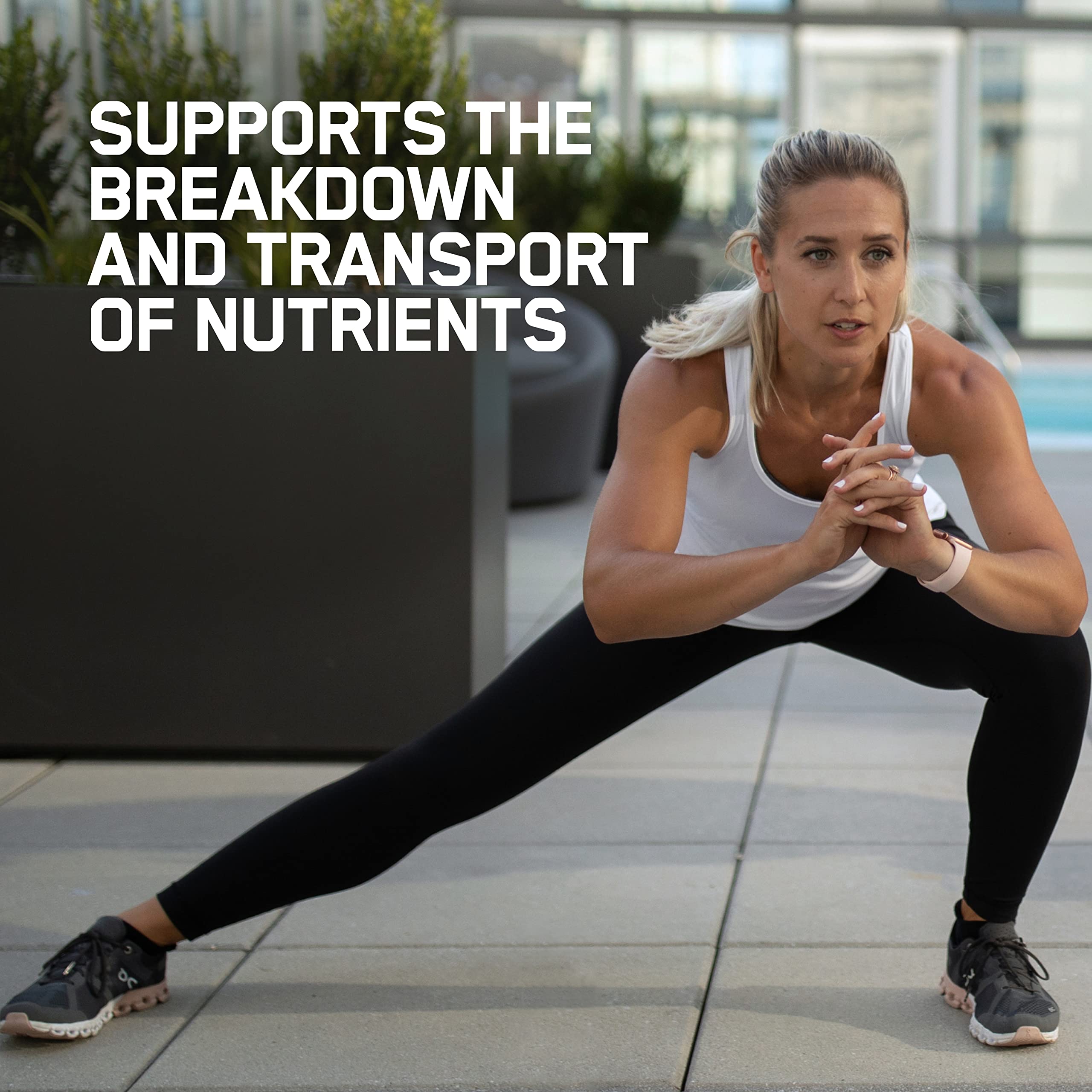 Optimum Nutrition comprimidos junto a una regla para comparar el tamaño