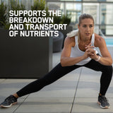 Optimum Nutrition comprimidos junto a una regla para comparar el tamaño