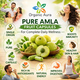 Organic Aura cápsulas junto a una regla para comparar tamaño