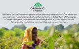 ORGANIC INDIA vista de finca y agricultores mostrando cultivo sostenible