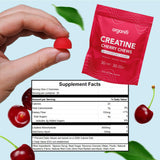 Organifi Creatine Chews enfoque en una gomita, sabor cereza apetitoso