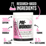 Vaso con Outwork Nutrition preparado en color Strawberry Lemonade listo para entrenar