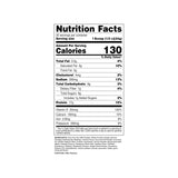 Perk frasco junto a una mano para comparar tamaño de 1.5 lb, ayuda a visualizar cantidad del producto