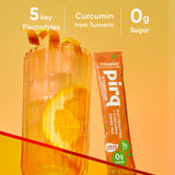 Pirq bebida naranja disuelta en vaso, refresco rápido y natural