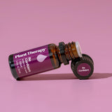 Plant Therapy junto a una regla, tamaño 10 ml para llevar