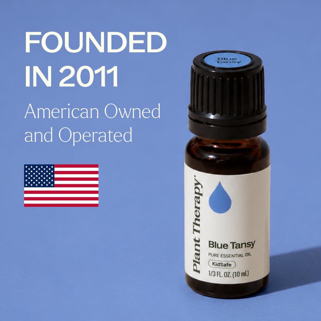 Plant Therapy frasco 10 mL al lado de objetos para comparar tamaño