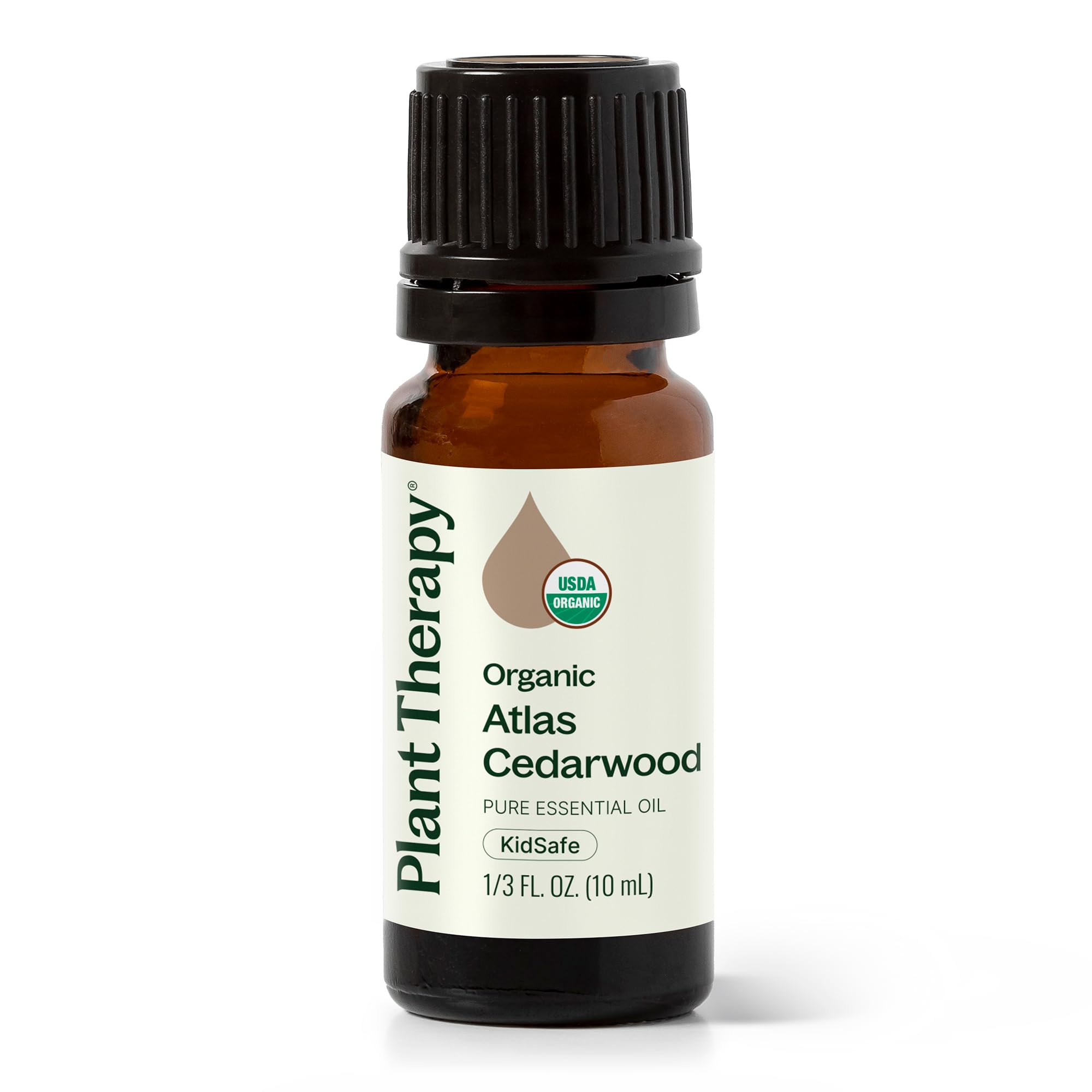 Plant Therapy frente de botella Cedro Atlas mostrando etiqueta y tamaño 10 mL, garantía de pureza