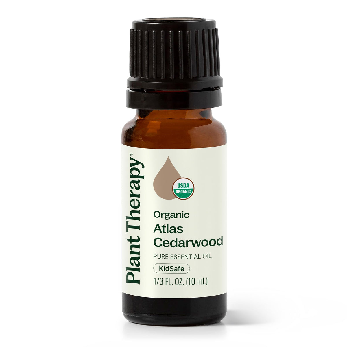 Plant Therapy frente de botella Cedro Atlas mostrando etiqueta y tamaño 10 mL, garantía de pureza