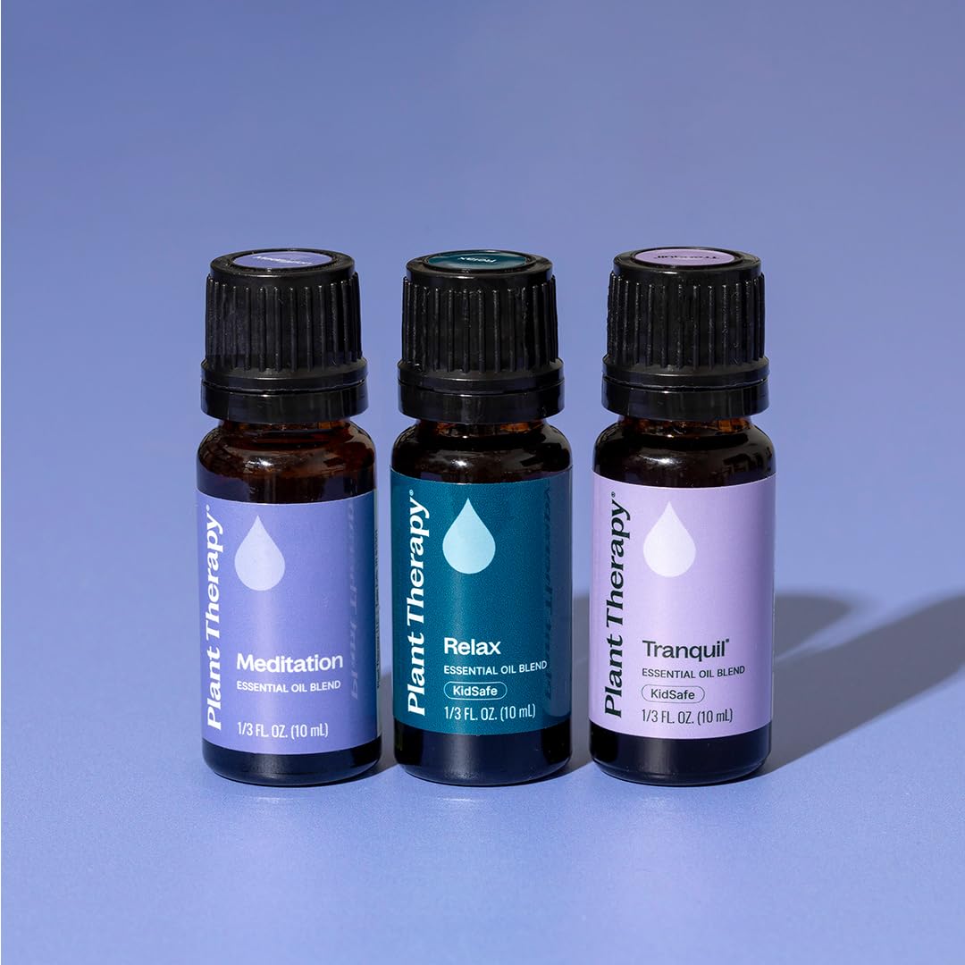 Plant Therapy frascos junto a moneda para comparar tamaño 10 ml