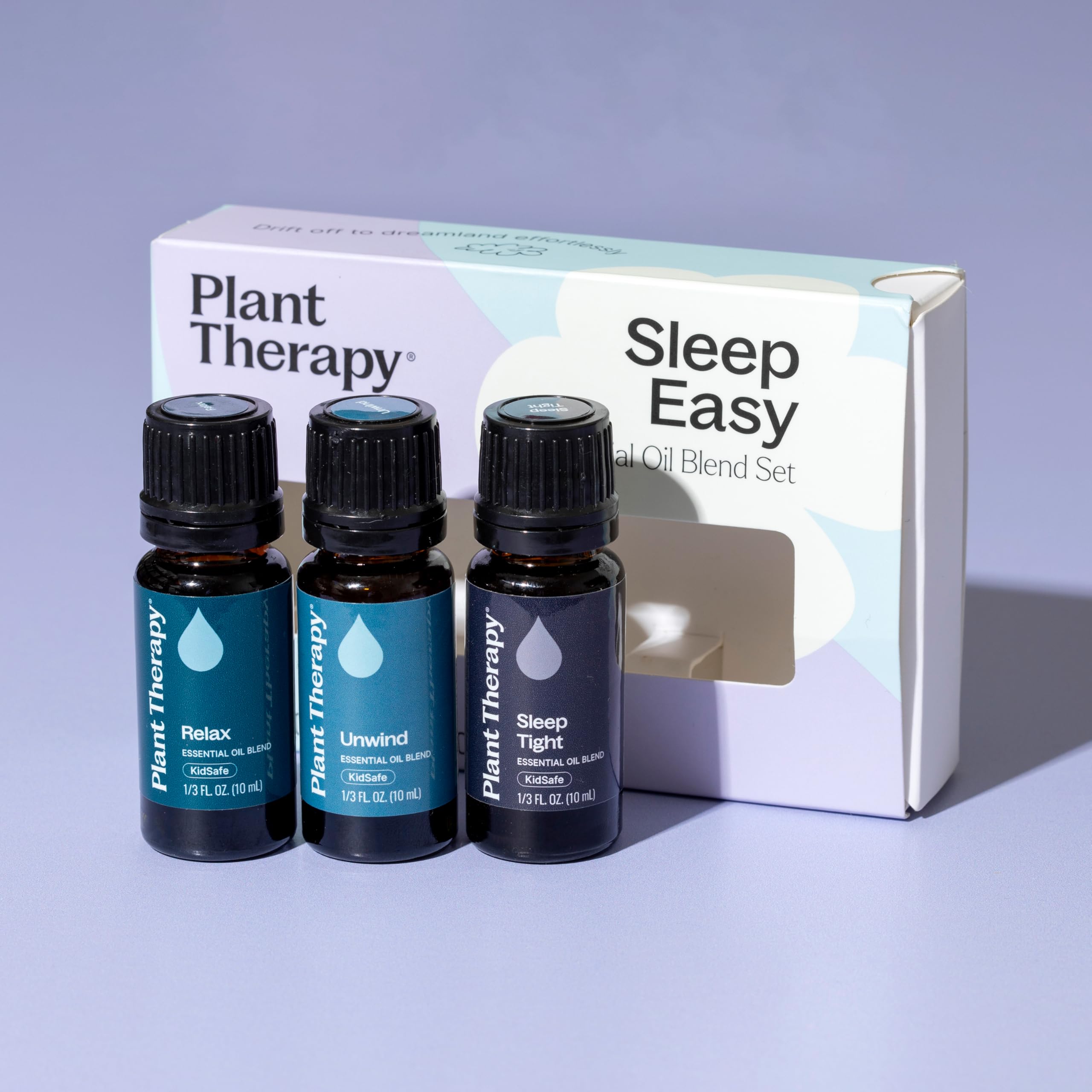 Plant Therapy frascos junto a una regla para comparar tamaño y 10 ml cada uno
