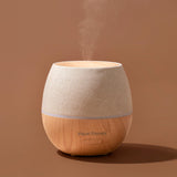 Plant Therapy difusor emitiendo niebla fina para aromatizar habitaciones