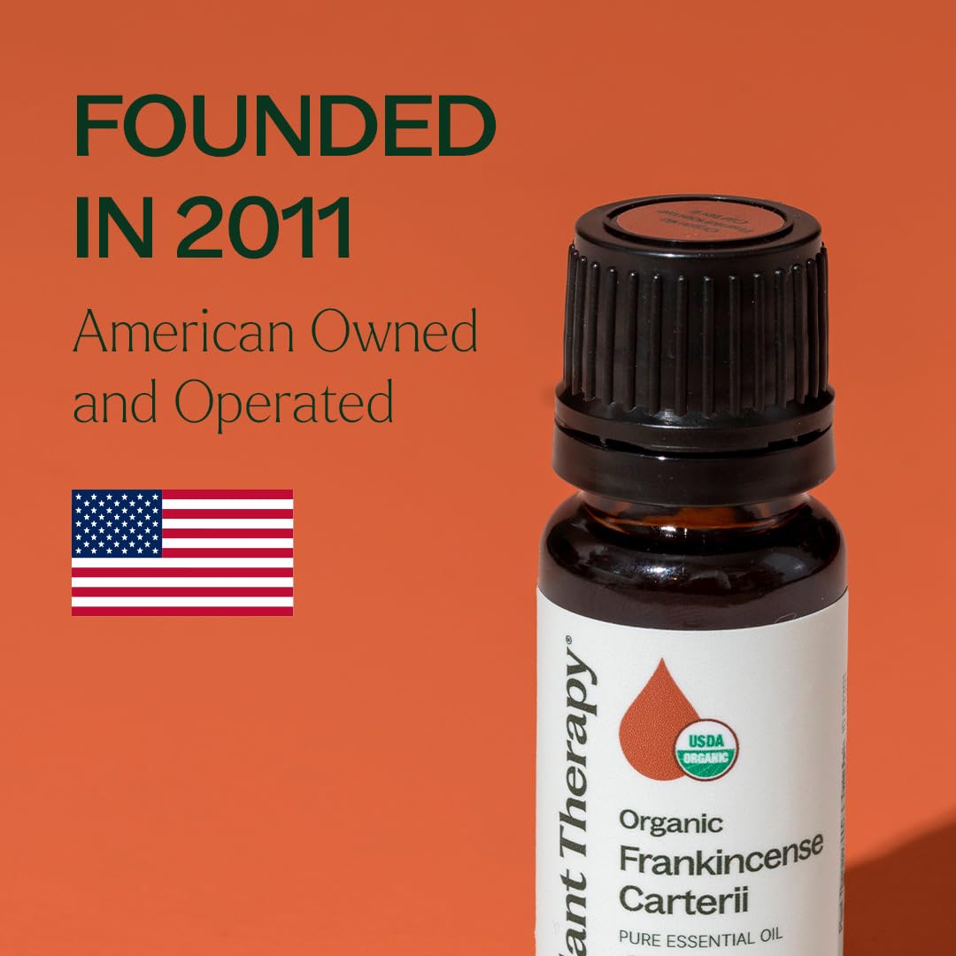 Plant Therapy frasco 10 ml junto a una moneda para comparar tamaño