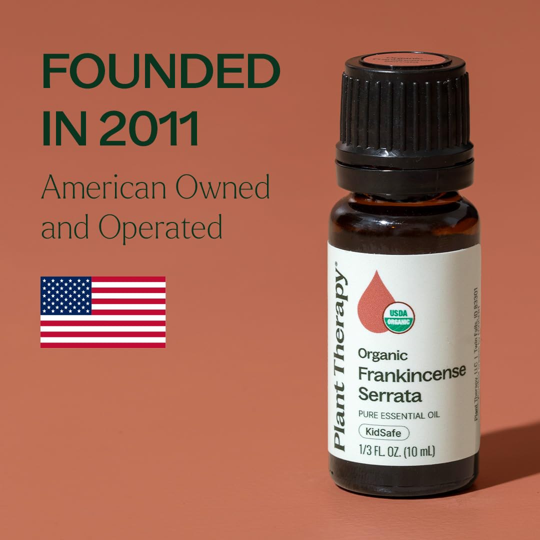 Plant Therapy botella de 10 ml junto a moneda para comparar tamaño