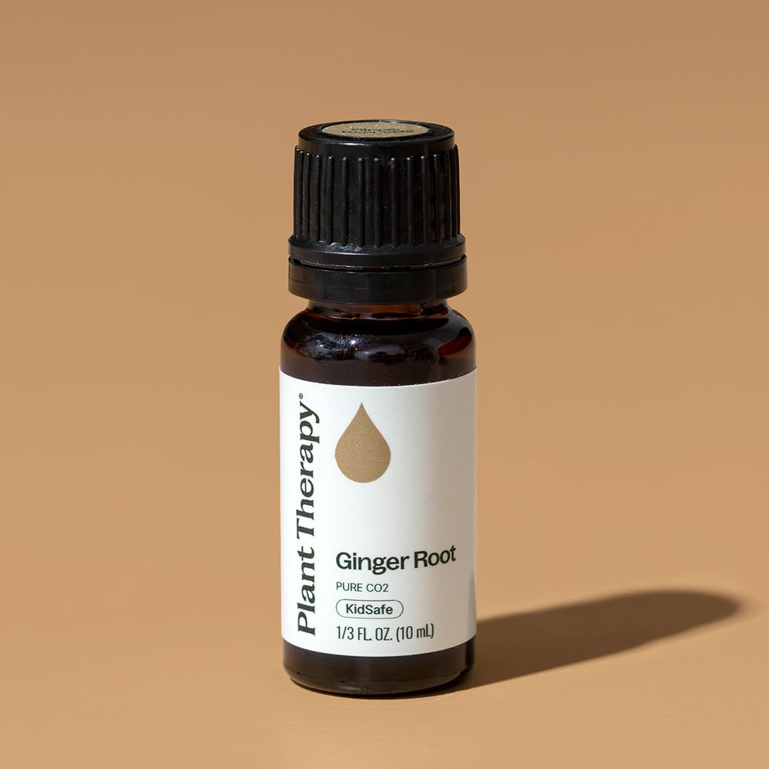 Plant Therapy botella de 10 ml junto a regla para comparar tamaño y escala