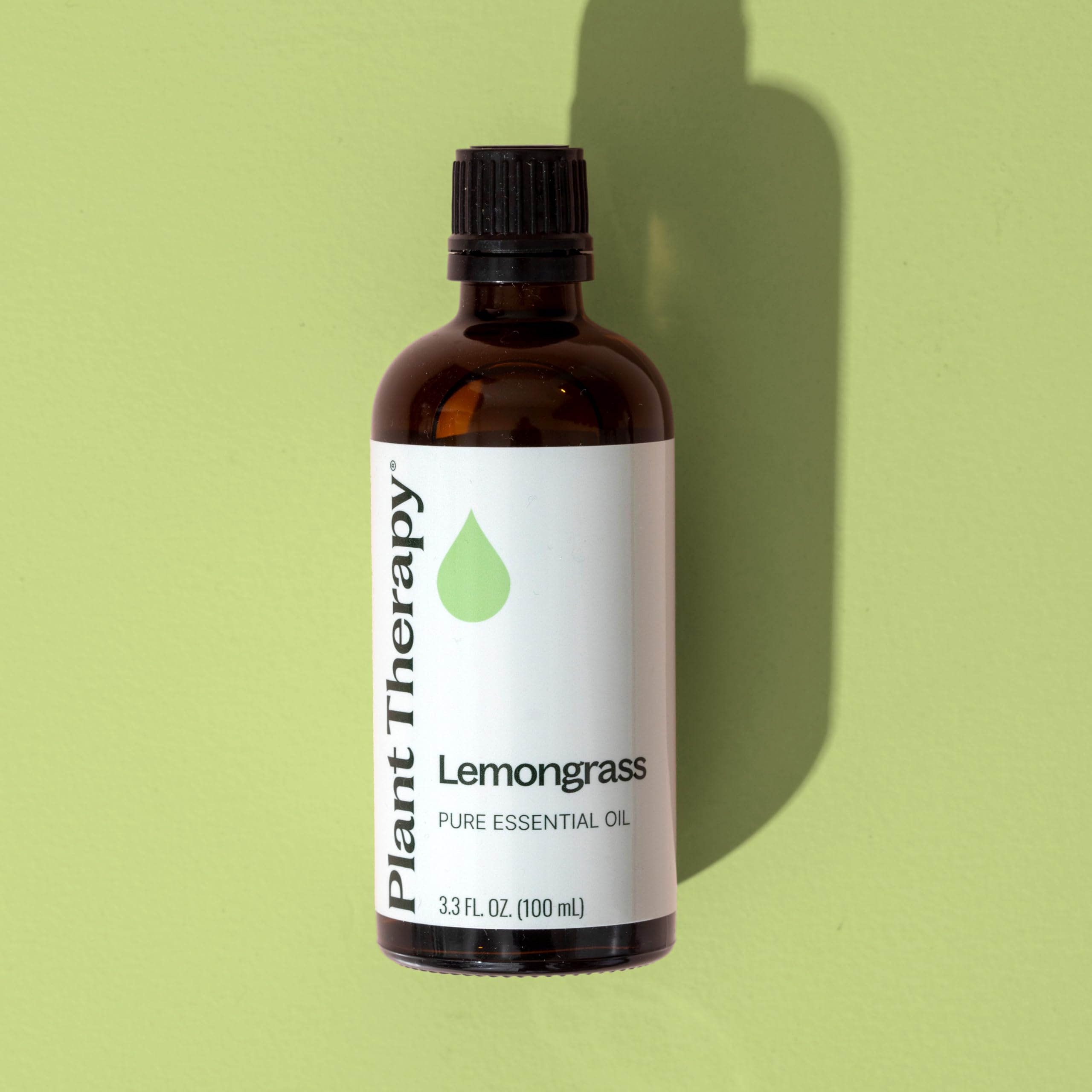 Plant Therapy botella junto a regla para comparar tamaño 100 mL práctico