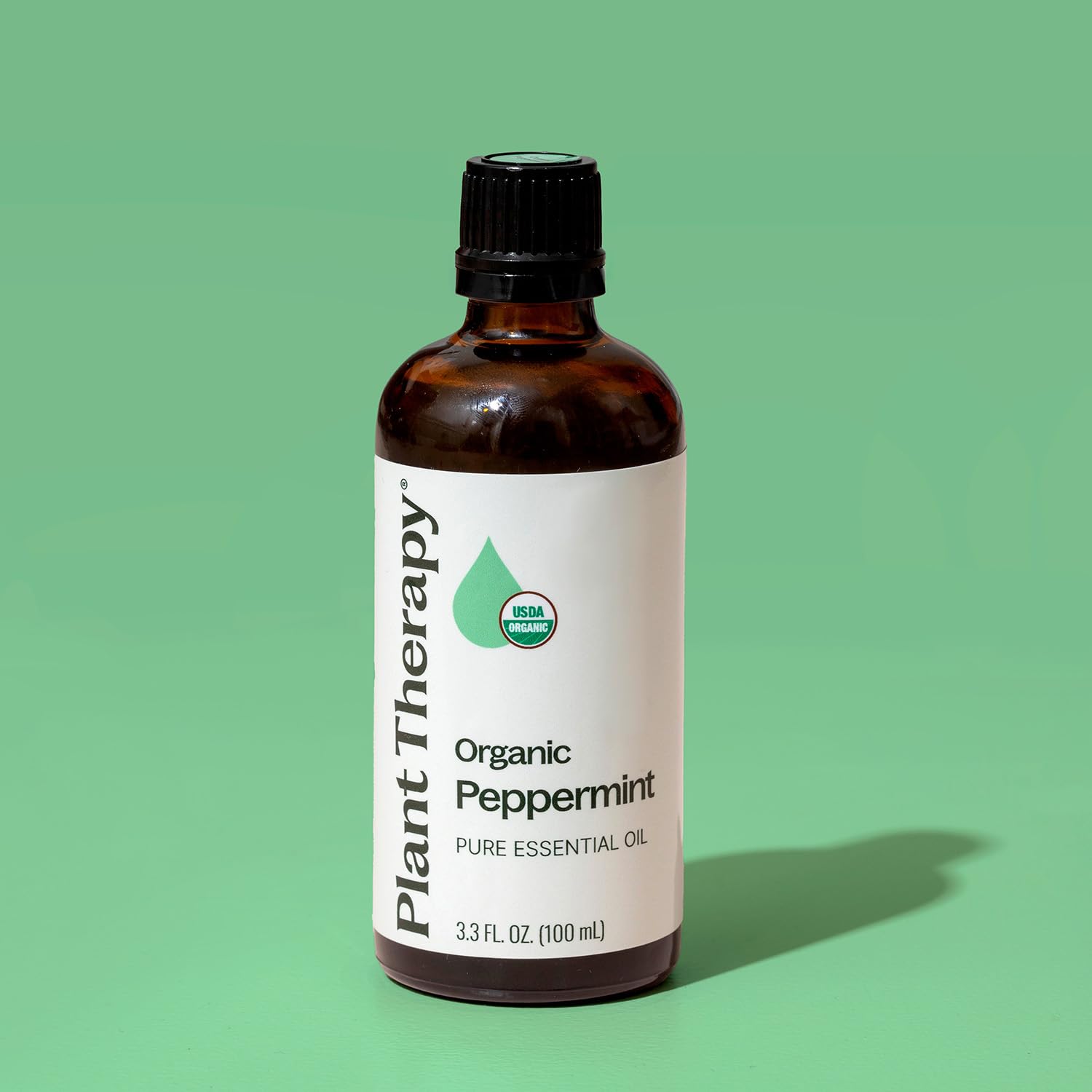 Plant Therapy frasco junto a regla para comparar tamaño y capacidad 100 mL