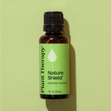 Plant Therapy frasco Nature Shield junto a regla, comparación de tamaño para llevar