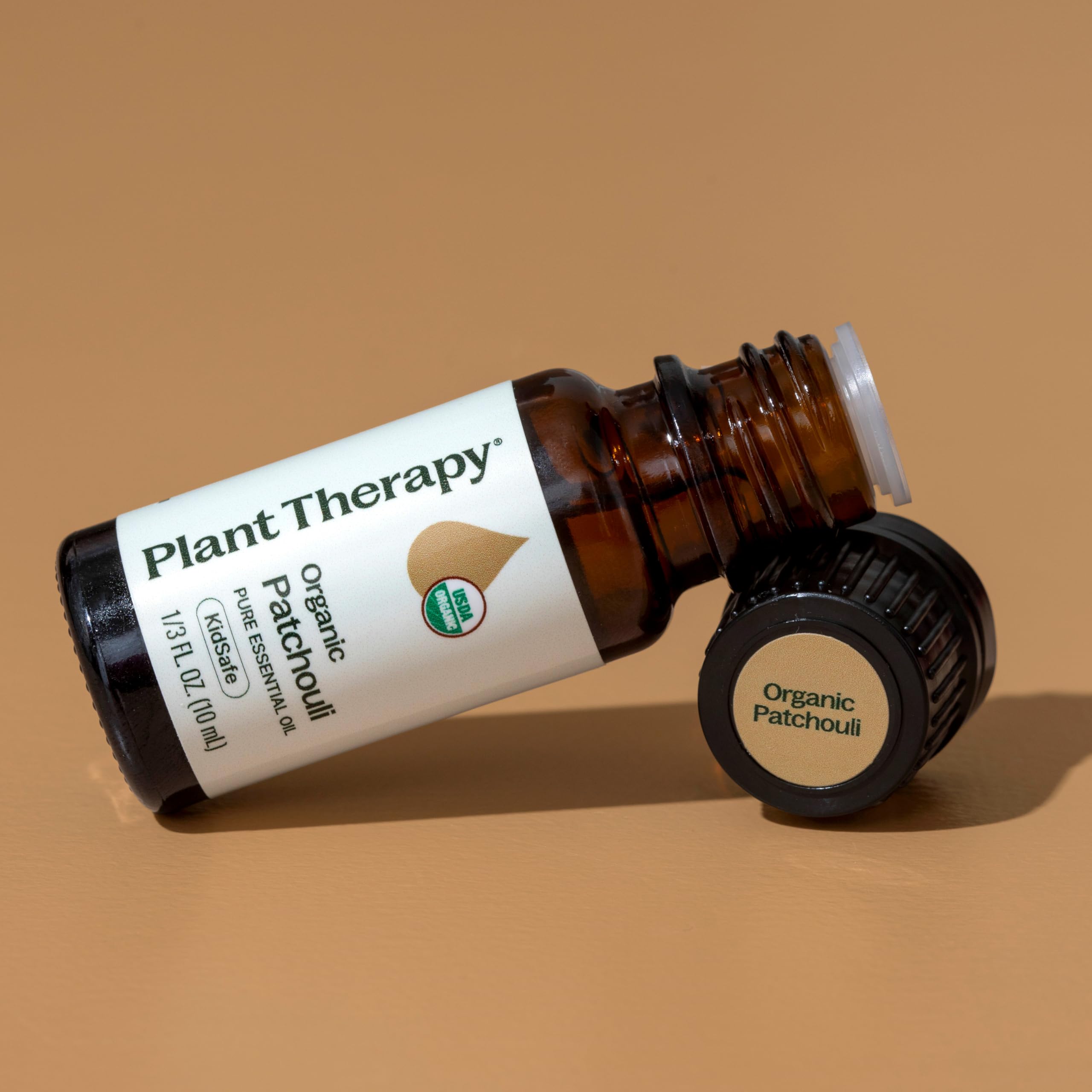 Plant Therapy etiqueta y documento GC-MS visible mostrando transparencia analítica