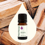 Plant Therapy gota sobre madera resaltando aroma amaderado