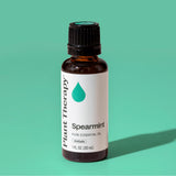 Plant Therapy botella junto a objeto cotidiano para comparar tamaño práctico
