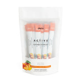 Plexus Active envase frontal mostrando sabor durazno mango y diseño claro